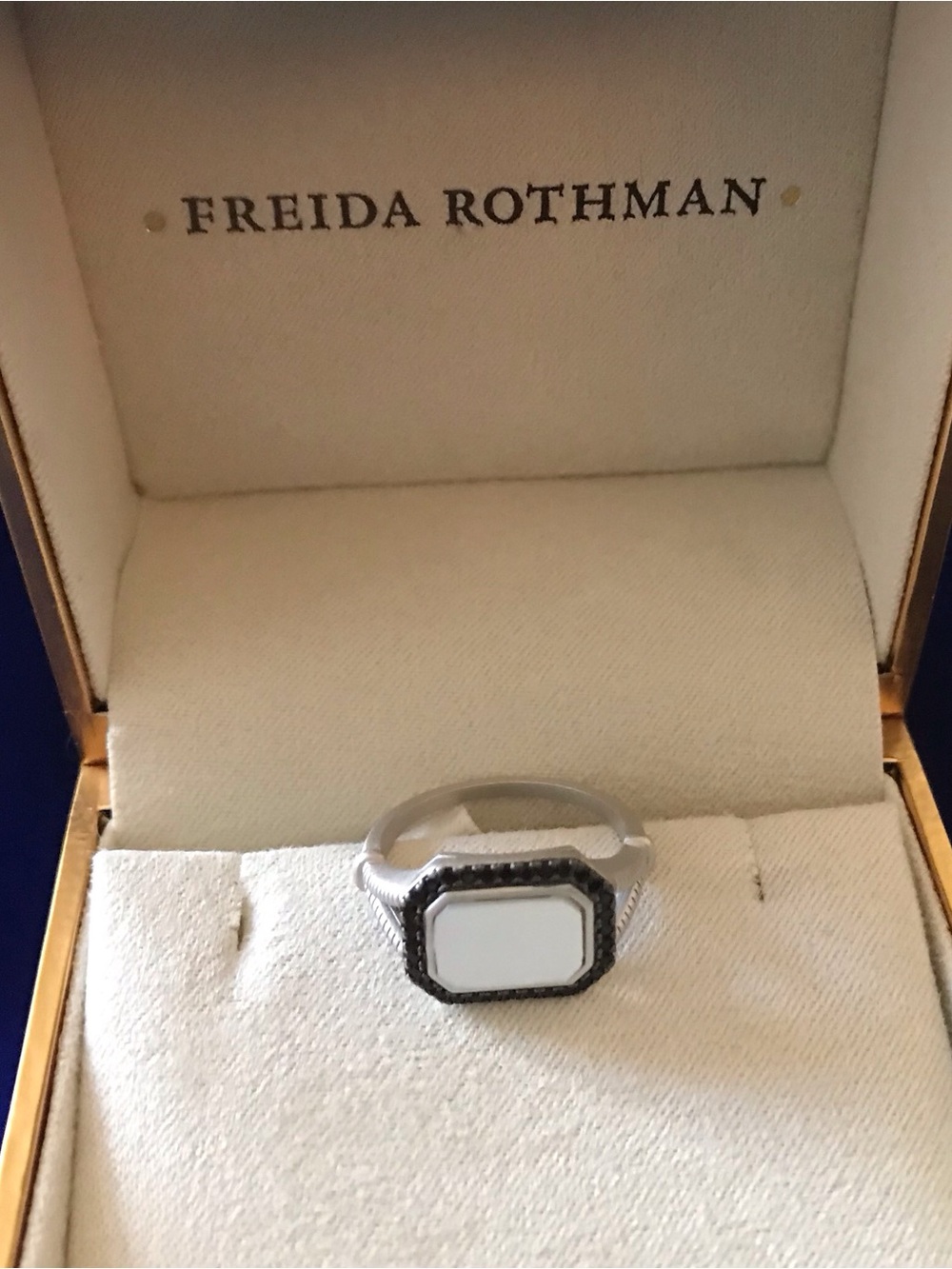 Freida Rothman 925 SS ring. MOP surrounded by Black CZ pave stones. Size 8